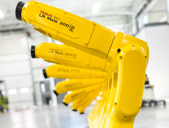 Seven Fanuc robotic arms up close