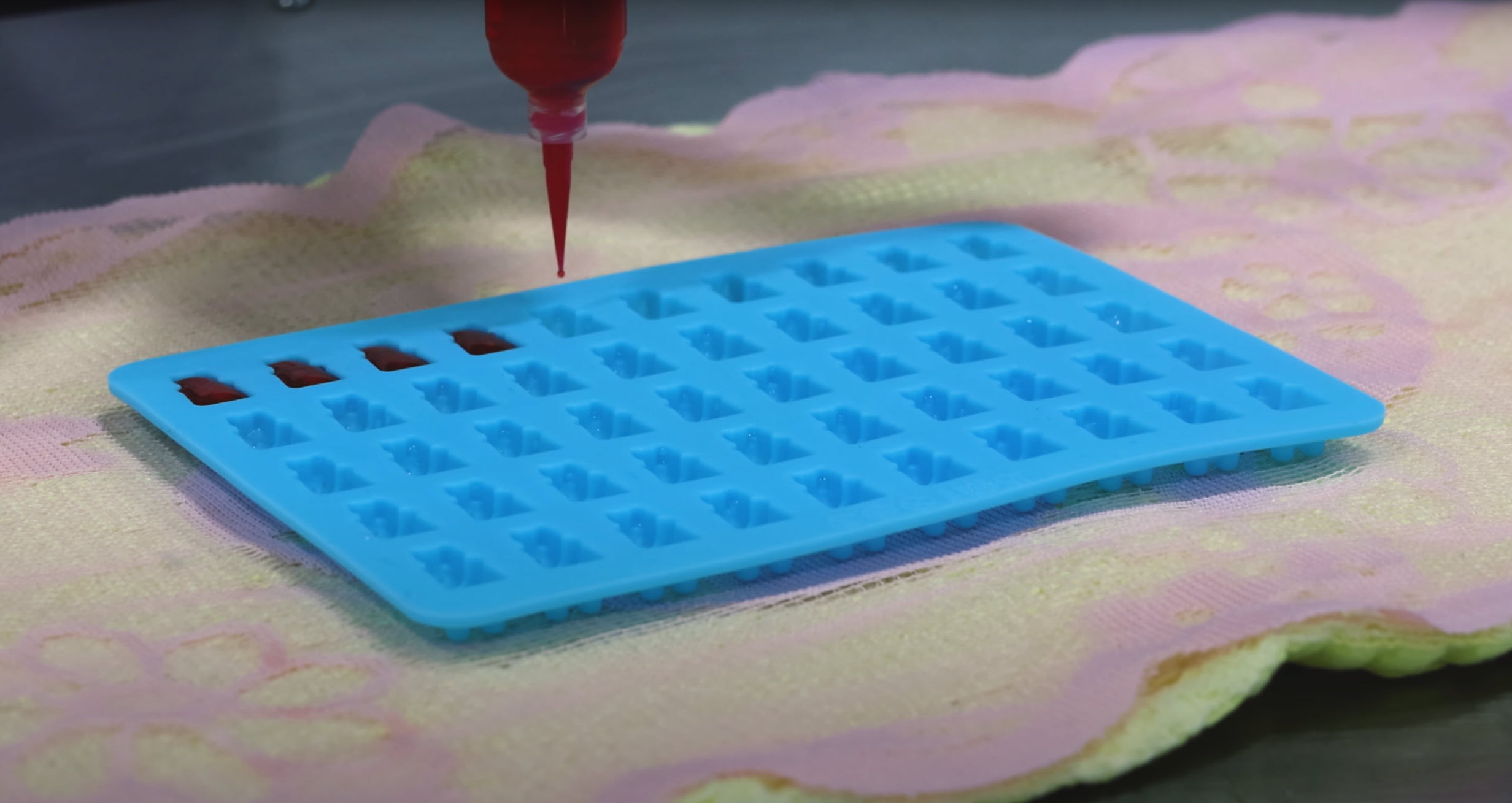 Dispense Buddy filling Gummy Bear Molds